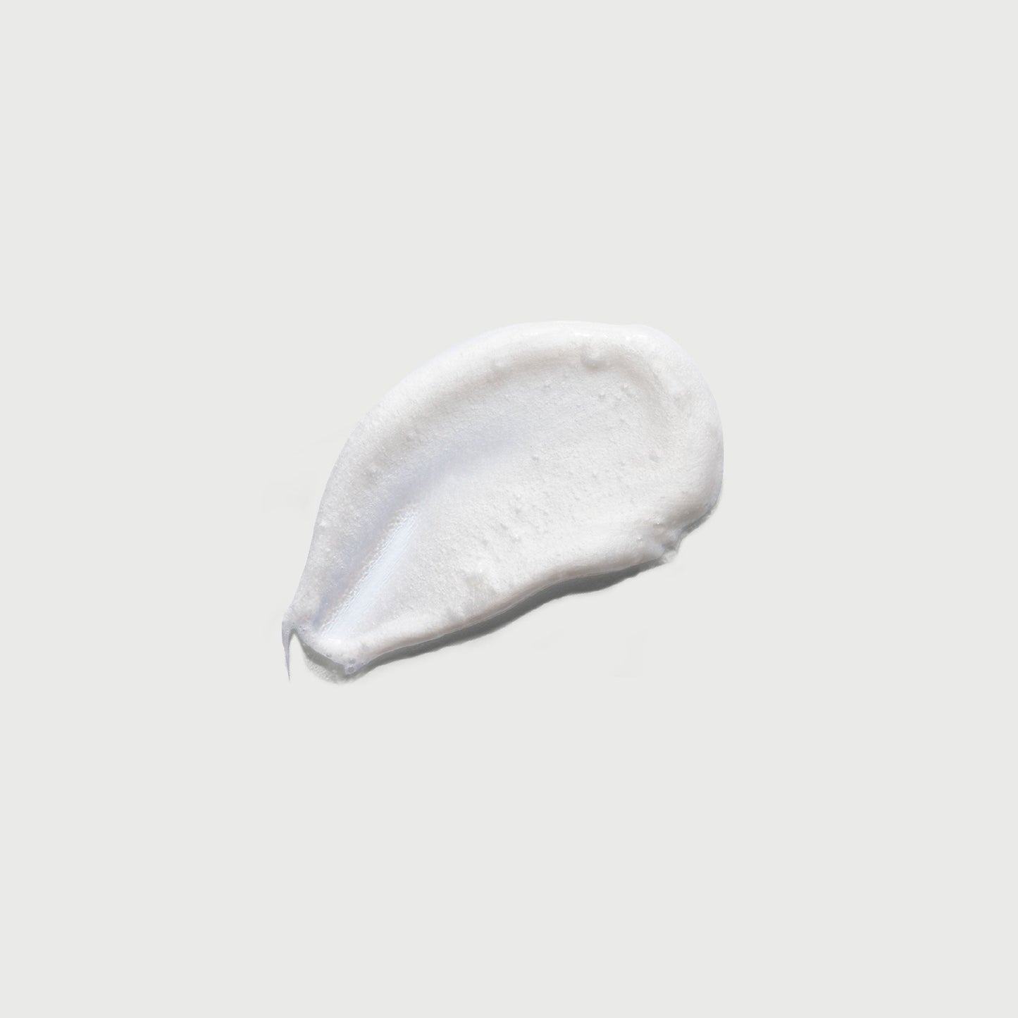 the-smoother-glycolic-acid-exfoliating-body-wash-j5 NATR-40002-Swatch-The-Smoother-Glycolic-Acid-Exfoliating-Body-Wash-bonebkgd.jpg