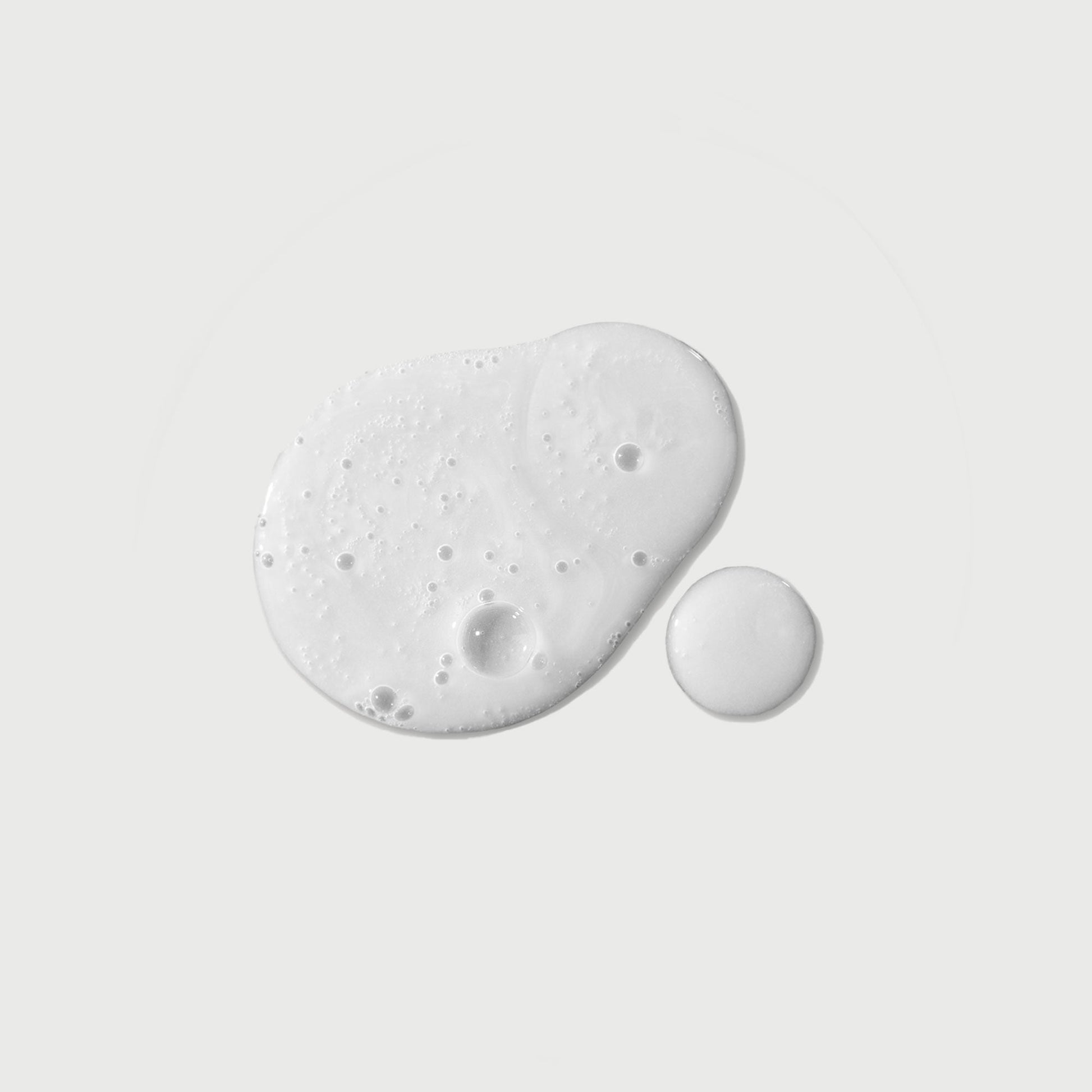 the-purifier-niacinamide-serum-body-wash-e4 NATR-40012-Swatch-The-Purifier-Niacinamide-Serum-Body-Wash-bonebkgd.jpg